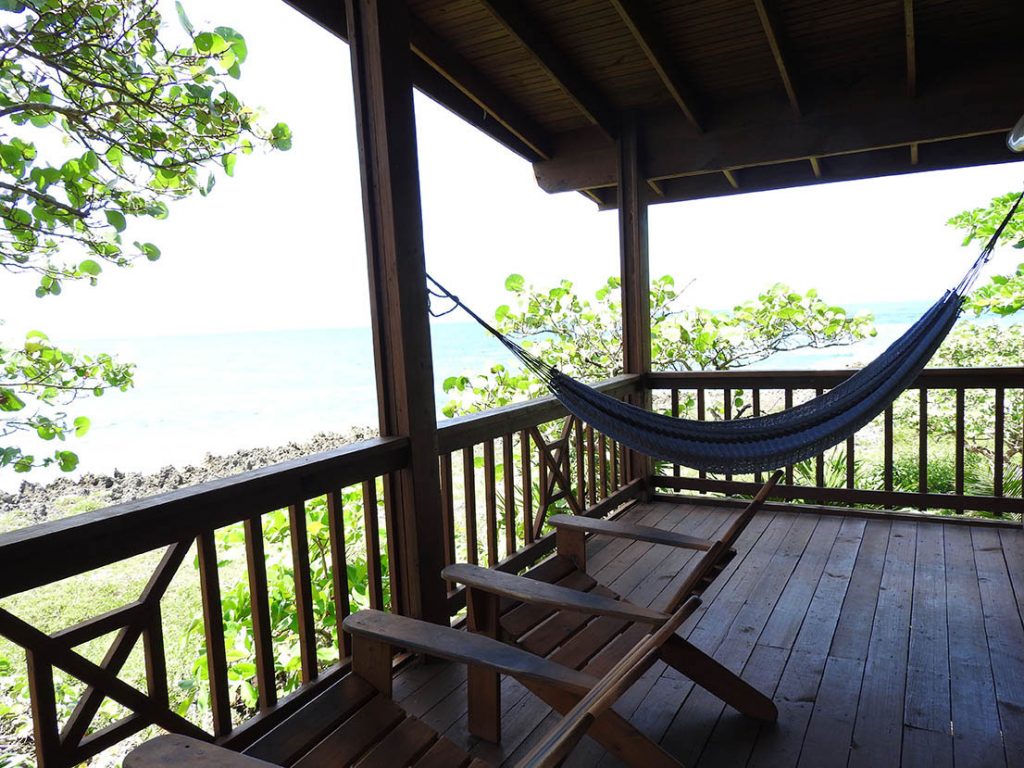 Relax in a hammock on your balcony at Cocolobo Hotel on Roatan Honduras