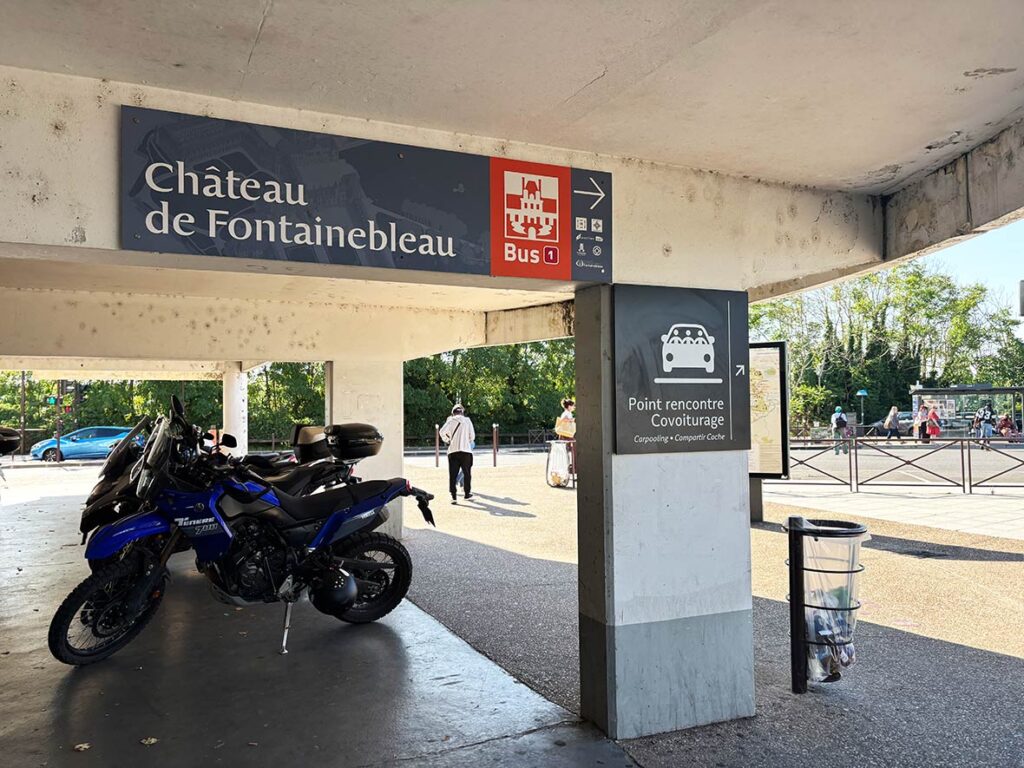 Sign for the Bus Stop to Fontainebleau Chateau at the Train Station